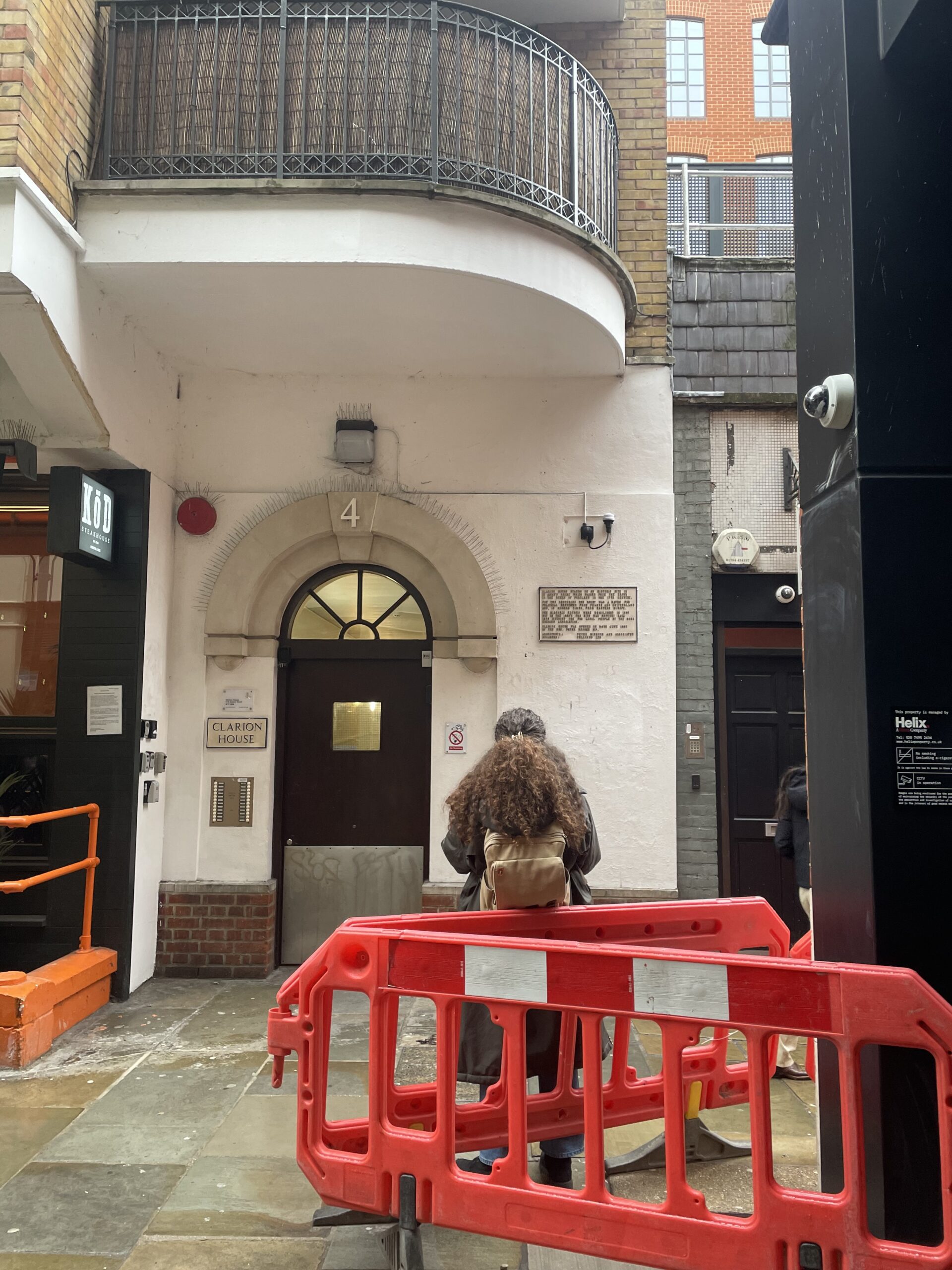 4. An immigrant outside Clarion House